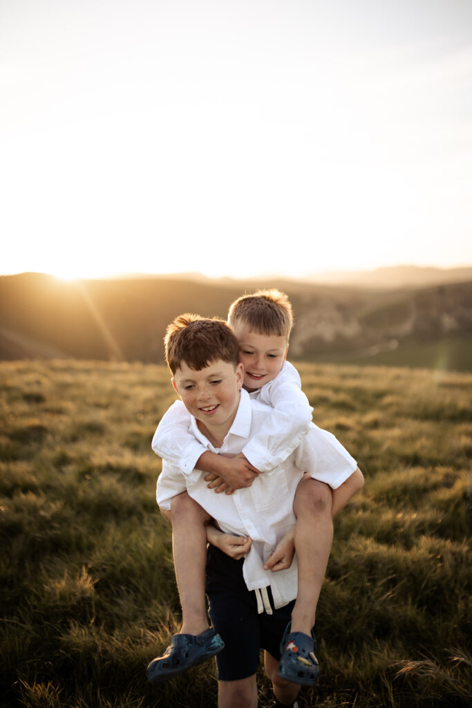oys playing during Family Photoshoot at Sunset in Hawkes Bay with Lightkeeper Photography