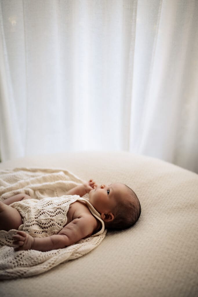 Newborn Baby awake during an newborn baby in home photoshoot in Hawkes Bay NZ